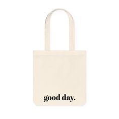 a white tote bag with the words good day printed in black ink on it