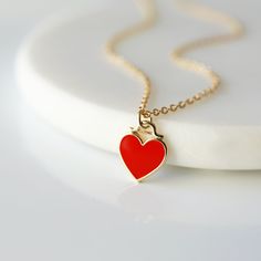 "Beautiful and lovely red heart charm necklace. Made of red enamel gold heart charm with skinny gold plated brass chain. Simple and warm. Great for gift, everyday or special occasion. Please choose chain color and length. Your item will ship in a gift box. Please feel free to contact me if you have any questions. ♥ Chain length available 14\" - 20\" ♥ Red heart 3/8\" ♥ Gold plated over brass/enamel ♥ See more Rudiana Accessories Rudiana.etsy.com" Pretzel Necklace, Flower Girl Necklace, Red Heart Necklace, Prom Necklaces, Gold Moon Necklace, February Valentines, Girl Necklace, Gift Flower, Infinity Necklace