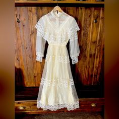 Beautiful, Purchased 40 Years Ago For My Wedding. Size 11/12 Never Worn Size 5/6 Worn Once Color; Cream Each Dress Has A Very Small Hole In The Lace. Can Likely Be Repaired. Cannot Be Seen When Worn. Lace Over Satin Lining Off White Lace Wedding Dress For Spring, Off-white Wedding Dress With Lace Trim, Off White Wedding Dress With Lace Trim, Fitted Off White Wedding Dress, Cream Fitted Lace Wedding Dress, Fitted Vintage White Lace Dress, Vintage White Lace Dress With Fitted Bodice, White Lace Vintage Dress For Formal Occasion, Cream Vintage Dress For Spring Wedding