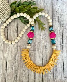 Yellow Beaded Necklaces With Large Beads For Summer, Summer Yellow Beaded Necklaces With Large Beads, Turquoise Necklace With Large Beads For Beach, Yellow Bohemian Jewelry For Vacation, Yellow Wooden Beaded Necklaces For Beach, Yellow Wooden Beads Necklace For Beach, Vibrant Beaded Beach Necklaces, Vibrant Beaded Necklace For Beach, Vibrant Beaded Beach Necklace