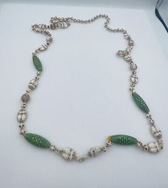 Max Neiger antique costume Czech white and green glass beaded necklace.Beautiful Egyptian Revival scarab beaded design.Necklace measures approximately 37 inches long.Very good condition. Czech Jewelry, Antique Jewelry Necklace, Antique Green, Heirlooms Jewelry, Egyptian Revival, Beaded Material, Green Glass, Czech Glass, Antique Jewelry