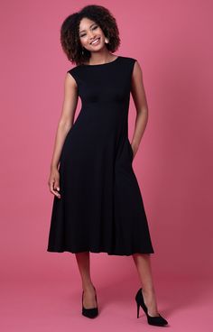 Feel utterly demure in the simplest, chicest and most flattering LBD of the season. In a class of its own, say hello to the Luna Midi in pure black. Feel neatly polished in a style with smooth lines, high neckline and nipped in empire waist. A swishy, playful skirt adds an element of fun, whilst the pockets are just non-negotiable. Made from sustainable Lenzing Ecovero viscose jersey which is knitted and dyed in the UK. Chic black jersey dress High neckline, nipped in empire waist, shoulder cove Empire Waist Midi Dress, Black Jersey Dress, Street Mode, Waterfall Dress, Annie Dress, Georgia Dress, Tiffany Rose, Red Carpet Gowns, Pure Black