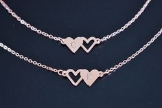 Personalized 2 Girls Sister Necklace, Rose Gold Sister Necklace for 2, Daughters Girls Jewelry, Rose Gold 2 Heart Necklace, Gift for her the listing is for 2 pieces of necklaces. heart charms is made of stainless steel, rose gold plated Handstamped Initials on charms. Charms size approx 8mm x 20mm and the length made at 18'', if you want different length, you can leave message with the order you placed. i will do that for you. the necklace comes with gift box, is ready for gift giving. the neckl Personalized Double Heart Necklaces For Friendship, Personalized Double Heart Friendship Necklace, Personalized Heart Necklace For Friendship, Double Heart Charm Necklace Valentine's Day Gift, Customized Heart Jewelry For Best Friend, Cute Customized Heart-shaped Jewelry, Customized Cute Heart-shaped Jewelry, Customized Cute Heart Jewelry, Cute Personalized Double Heart Jewelry