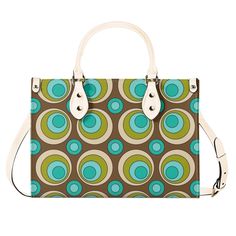 This funky satchel is a blast from the past, with a mid century modern design featuring groovy orbs. With its retro style, it's sure to make a statement while also offering practicality. Carry all your essentials in one stylish bag. Get ready to turn heads and embrace your inner hippie! Premium PU Leather: Crafted from high-quality PU leather for durability and style. Versatile Sizing: Available in three sizes to suit your needs and preferences. Sturdy Top Handles: Features two sturdy top handle Retro Green Tote Shoulder Bag, Retro Green Satchel Shoulder Bag, Retro Green Satchel In Tote Shape, Green Retro Shoulder Bag For Shopping, Vintage Green Satchel For Shopping, Retro Brown Shoulder Bag For On-the-go, Retro Green Shopping Bag, Retro Green Bags, Retro Multicolor Satchel For Daily Use