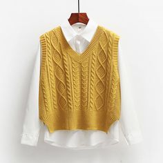 Channel some serious preppy princess vibes with the Rossana Cable-knit Vest. Featuring a wool blended knit material all over, a cropped length silhouette, a ribbed detail at the edge, and a pull-on style. 100% Polyester Pull-on style Imported Khaki Vest, Cable Knit Vest, Yellow Vest, Outwear Fashion, Sleeveless Jumper, Stylish Coat, Sweater Vest Women, Loose Sweater, Women Shirts Blouse