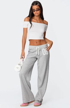 Reach your ultimate level of coziness while still feeling on-trend with these perfect 06 sweatpants from Edikted.SweatpantsStraight leg fitAdjustable tie waistEmbroidered patchCotton, PolyesterModel wears size SModel height is 5'8Item care: Machine wash at maximum 30C, do not bleach, do not tumble dry, iron at a maximum of 110C, do not dry clean. Edikted Womens 06 Sweatpants - Gray size Medium Sweatpants Straight Leg, Camo Sweatpants, Cute Sweats, Cute Sweatpants, American Casual, Printed Wide Leg Pants, Swimwear Dress, Grey Sweatpants, Swimwear Cover Ups