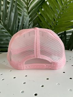 This is a one size fits most trucker hat. The back is mesh and breathable and it has an adjustable backing. It is a solid light pink color with green embroidery that says "save water drink margs". Fabric is 100% Polyester. Save Water Drink, Green Embroidery, Water Drink, Pink Drinks, Jewelry Candles, Light Pink Color, Backpack Tote Bag, Scarf Hat, Dress Jewelry