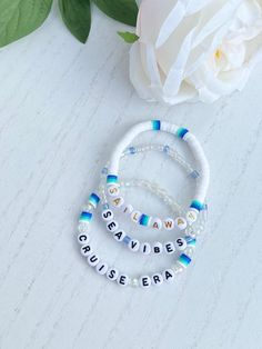 Let's Sail Away Set 🛳☀️⚓️ ☀️Sail Away- ❋ Listing is for one Clay Bead Bracelet with an Elastic Cord  ❋ Gold Letter Beads  ❋ White Clay Beads  ❋ Blue Ombre Clay Beads  ❋ One size fits most  ❋ Colors may vary due to lighting  ☀️Sea Vibes- ❋ Listing is for one Seed Bead Bracelet with an Elastic Cord  ❋ Black Letter Beads ❋ Clear Seed Beads ❋ Blue Seed Beads ❋ One size fits most  ❋ Colors may vary due to lighting  ☀️Cruise Era-  ❋ Listing is for one Acrylic and Clay Bead Bracelet with an Elastic Co Cruise Bracelets, Vacation Bracelets, Bracelets Preppy, Sea Vibes, Make Clay Beads, Colorful Bead Bracelets, Clay Bracelets, Pony Bead Bracelets, Heishi Bracelet