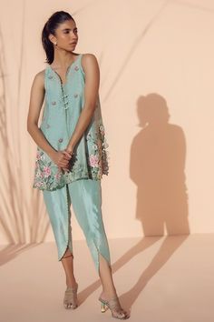 A soft baby blue cotton net front-open kurta with our signature floral embroidery is a fresh addition for the summer season. Paired with our matching raw silk tulip shalwar. Summer Chanderi Kurta With Floral Embroidery, Spring Straight Kurta With Sheer Dupatta, Spring Anarkali Kurta With Sheer Dupatta, Spring Kurta With Sheer Dupatta In Chanderi, Spring Chanderi Kurta With Sheer Dupatta, Spring Bollywood Sets With Chikankari Embroidery, Festive Sets With Sheer Dupatta For Spring, Spring Festive Sets With Sheer Dupatta, Summer Cotton Silk Lawn Suit With Chikankari Embroidery