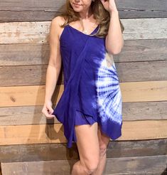 This dress is soft, light, and perfect for beach to the boardwalk, strolling through town, or any casual activities. Doubles as a cover-up too. Features a flowy layer, and tie-back straps for the perfect fit. True to size. Breezy Sundress With Adjustable Straps, Chic Flowy Sundress For Beach Season, Chic Spaghetti Strap Beach Dress, Flowy Sundress For Summer Outings And Beach Season, Chic Sundress With Spaghetti Straps For Beach Cover-up, Chic Spaghetti Strap Sundress For Beach Cover-up, Chic Flowy Beach Dress For Summer Outings, Breezy Sundress With Spaghetti Straps, Casual Beach Dress With Adjustable Straps For Day Out