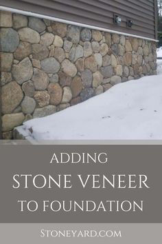 a stone veneered wall in front of a house with the words adding stone veneers to foundation