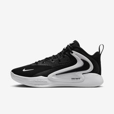 a black and white nike basketball shoe with the word,'team spirit'on it