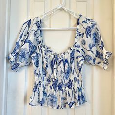 Size: Small|| Color: Blue And White Floral|| Never Worn Before Blue Summer Tops For Daytime, H&m Floral Print Tops For Day Out, Casual Blue H&m Blouse, Casual Floral Print Blouse By H&m, Spring Daytime Blue Blouse, Spring Blue Blouse For Daytime, H&m Blue Summer Tops, Chic Blue H&m Tops, H&m Blue Tops For Summer