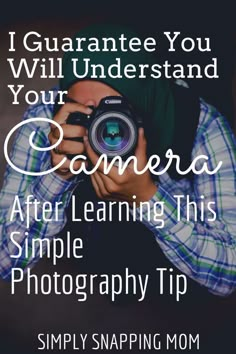 a person holding a camera with the words i guarantee you will understand your camera after learning this simple photography tip simply snapping mom