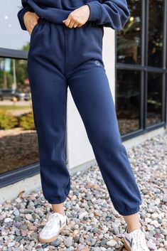 PRODUCT DESCRIPTION Get your cool, casual look on-point in the Smiley Sweatpants. Featuring a high elasticated waistband, elasticated ankles, side pockets, soft fleece fabric for extra comfort and embroidered smiley logo on front of the left leg. You can complete the tracksuit with the matching Smiley Hoodie for the perfect off-duty look. DETAILS & FIT Relaxed loose fit Elastic waist Elastic ankles Slant pockets Rise: 12.5" (based on a size small) Inseam: 30" (based on a size small) FABRIC & CARE 50% cotton 50% polyester Hand wash Athleisure Ankle-length Pull-on Joggers, Trendy Solid Joggers With Tapered Leg, Trendy Solid Pants With Elastic Cuffs, Sporty Ankle-length Pull-on Joggers, Leisure Bottoms With Comfort Waistband And Tapered Leg, Trendy Sweatpants With Elastic Waistband For Jogging, Sporty Cotton Pull-on Joggers, Fall Sporty Joggers With Elastic Waistband, Trendy Leisure Pants With Elastic Cuffs