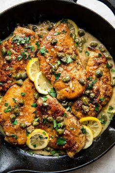 chicken with lemons and capers in a skillet