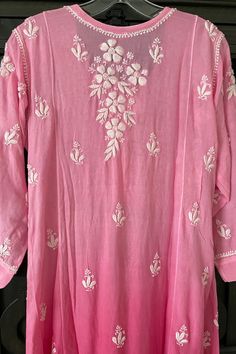 This Pink Ombre Muslin Silk Handcrafted Lucknowi Chikankari A Line Kurta Long Dress is a stunning piece of art. The beautiful pink shade dress is perfect for any special occasion. The luxurious fabric and intricate Lucknowi Chikankari embroidery make it a timeless piece that will never go out of style. Length 48" inches Long sleeves 18" inches Round neck A line Muslin silk Chikankari work Hand embroidered Margin: no Dry Clean Luckhnavi Kurtis, Phulkari Pants, Lucknowi Kurta, Gharara Suits, Patiala Salwar Suits, Chikankari Work, Chikankari Embroidery, Bridal Dupatta, Phulkari Dupatta