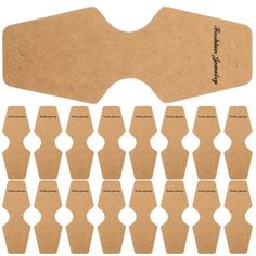 the back side of a cardboard board with several pieces cut out to make it look like they