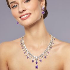 Indulge yourself in this shimmering bonanza. This collection oozes style and sophistication and is sure to make you stand out in a crowd. The mount is expertly set with shimmering, deep regal purple and ice white Diamondeau®, flawless simulated diamond. The collection is given a truly decadent feel with a glimmering golden finish. Complete the look with the matching earrings making you statement ready for the festive season. Elegant Purple Jewelry For Formal Occasions, Elegant Lavender Jewelry For Evening, Elegant Lavender Evening Jewelry, Elegant Purple Jewelry With Diamond Accents, Luxury Purple Jewelry For Wedding, Formal Purple Jewelry With Diamond Accents, Luxury Purple Jewelry For Party, Purple Luxury Jewelry For Party, Dazzling Purple Wedding Jewelry