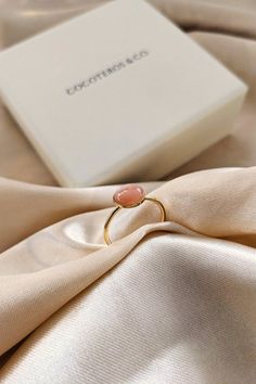 Brilliantly elegant, the delicate Eurydice gold ring in pink stone can be worn every day and enhances all hands. Elegant handcrafted ring in 16k gold plated. Ideal as a gift! It is topped with a sublime pink feldspar moonstone which promotes love, tenderness and gentleness. It soothes the heart and stimulates creative intelligence and intuition. ♥ 24K gold plated and Feldspar Moonstone (pink) or Blue Apatite. ♥ Adjustable size. ♥ Durable & water resistant. ♥ Ready to give (gift bag included). IN 14k Gold Filled Open Midi Rings As Gift, Minimalist Gold-plated Crystal Ring As Gift, Minimalist Gold Plated Crystal Ring As Gift, Gold Plated Minimalist Crystal Ring As Gift, Gold Moonstone Open Ring With Natural Stones, Adjustable 14k Gold Opal Ring Gift, Dainty Gold Plated Crystal Ring For Gift, Delicate Gold Moonstone Ring Gift, Gold Plated Crystal Gemstone Ring As A Gift