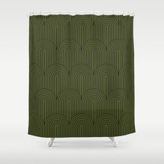 a green shower curtain with an art deco design