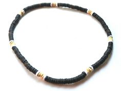 Beach Jewelry With Gold And Black Beads, Gold Jewelry With Black Beads For The Beach, Casual Black Beaded Choker Necklace, Black Round Bead Jewelry For Vacation, Black Round Beads Jewelry For Vacation, Black Round Beads Jewelry For Beach, Black Round Bead Jewelry, Black Beaded Jewelry For The Beach, Black Beaded Necklace For Vacation