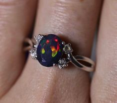 Hey, I found this really awesome Etsy listing at https://www.etsy.com/listing/582023317/natural-black-fire-opal-engagement-ring Black Fire Opal Engagement Ring, Black Fire Opal Ring, Black Oval Opal Jewelry, Oval Black Opal Jewelry, Black Opal Ring For Anniversary, Black Oval Opal Gemstone Ring, Black Oval Opal Ring, Unique Engagement Rings Black, Black Opal Engagement Ring