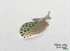 "Natural Leaf Brooch made of 925 silver and enamel. This handmade enamel Leaf brooch is inspired by the leaf shapes and their life cycles. The one of a kind piece is enhanced with the use of green and turquoise enamel. It's a very organic piece cut. This modern silver brooch is a unique piece of contemporary jewelry. Details: Weight: 10 g Width: 34 mm = 1.34\" Length: 86 mm = 3.44\" Enjoy and thanks for looking!! Follow me www.facebook.com/jewelersoul Visit my shop for a matching also pendants: Green Enamel Brooch Pin As Gift, Green Brooch Enamel Pin For Gift, Green Enamel Pin Brooch For Gift, Unique Green Enamel Pin, Unique Green Enamel Pin Gift, Handmade Green Enamel Brooches, Green Sterling Silver Brooch Jewelry, Green Sterling Silver Brooch, Green Sterling Silver Brooches As Gifts