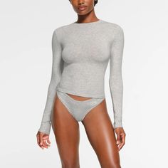 Shirts & Tops for Women - Cotton Tank Tops & T-Shirts | SKIMS Long Sleeve Turtleneck, Cotton Tank Top, Basic Shirts, Grey Long Sleeve, Basic Outfits, Grey Fashion, Long Sleeve Bodysuit, Heather Grey, Long Sleeve Tees