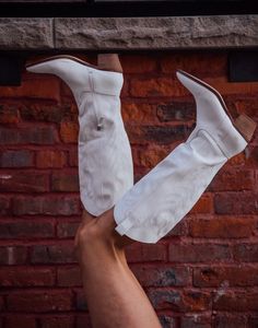 The hottest trend of 2022 are white boots no doubt and these fit the bill. Man made upper. Leather wrapped heel. Shaft height is 13.75". Heel height is 2.5". Half zip closure. Boot opening is 15" circumference. Running true to size. If you toggle between two sizes, go with your larger size. White Western Heeled Boots For Fall, White Knee-high Boots With Wide Calf, White Knee-high Boots For Wide Calves, White Western-style Fitted Heeled Boots, Casual White Knee-high Boots With Round Toe, White Fitted Western-style Heeled Boots, White Western Knee-high Boots With Wide Calf, White Wide Calf Western Knee-high Boots, White Wide Calf Knee-high Heeled Boots