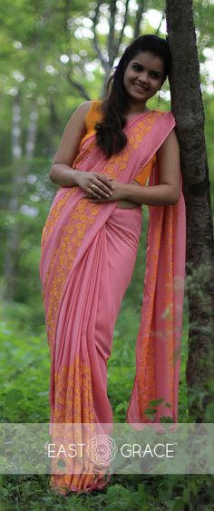 Featuring a coral pure georgette saree from EAST & GRACE with orange gingko leaf rows on pallu and skirt of the saree. It comes with an unstitched orange sleeveless blouse. Visit www.eastandgrace.com. Price: RS.13,000. Peach Georgette Saree With Unstitched Blouse, Festive Peach Georgette Saree, Georgette Saree With Printed Border, Bollywood Saree, Soft Silk Sarees