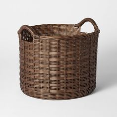 an empty wicker basket on a white background