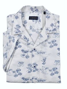 Relax and dream away in a cool casual lifestyle. Made with soft white cotton seersucker fabric and a matching island motif print in warm blue, this shirt brings a cool and comfortable look. Its pajama top collar adds to the relaxed fit, making it perfect for your island getaway. White Relaxed Fit Camp Shirt With Spread Collar, Spring Loungewear Shirt With Camp Collar, White Short Sleeve Sleepwear For Vacation, Printed Relaxed Fit Camp Shirt With Spread Collar, Spring Camp Collar Shirt For Loungewear, Summer Cotton Sleepwear With Camp Collar, White Cotton Camp Shirt For Vacation, Collared Shirt For Summer Loungewear, White Camp Shirt With Spread Collar For Vacation