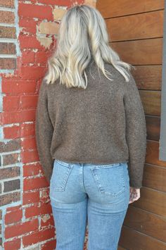 The Basically Brown Turtleneck Sweater is a timeless and versatile piece that embodies understated elegance and comfort. This sweater is crafted from soft, cozy materials like wool, cashmere, or a high-quality synthetic blend, making it perfect for cooler weather. The rich brown color adds warmth and depth to your wardrobe, offering a neutral tone that pairs effortlessly with a wide range of other colors and patterns. The turtleneck design provides extra coverage and warmth, making it ideal for Solid Wool Sweater For Everyday, Everyday Solid Wool Sweater, Everyday Wool Sweater In Soft Knit, Cozy Cropped Sweater For Everyday Fall Use, Classic Cropped Sweater For Fall Layering, Relaxed Fit Merino Wool Sweater For Fall, Winter Knit Cropped Sweater, Everyday Knit Cropped Sweater For Fall, Versatile Cropped Sweater For Fall Layering