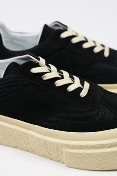 Crafted with perforated leather and panelling, these Chunky Gambetta Sneakers from MM6 boast a textured platform sole in rubber and an adjustable strap. The brand's numeric signature at the back adds a touch of style to these versatile shoes. Elevate your footwear game with these comfortable and fashionable sneakers. Upper: 100% calf Leather Lining: 100% calf leather Inside: 100% calf leather Sole: 100% rubber Platform court shoes in perforated leather Adjustable strap MM6 numeric signature at the back Made in Italy Black Popeye Magazine, Canoe Club, Versatile Shoes, Comme Des Garcons Play, Perforated Leather, Mm6 Maison Margiela, Engineered Garments, Court Shoes, Sweater And Shorts