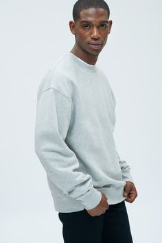 Designed to be lived in. A sleek crew-neck sweatshirt, featuring a slight dropped shoulder and inset sleeves—an understated look that can be dressed up or down. Men's Essential Sweatshirt Classic Relaxed Fit Sweats For Fall, Urban Style Sweatshirt For Loungewear, Basic Sweats With Ribbed Cuffs, Gray Drop Shoulder Sweater With Ribbed Cuffs, Everyday Basic Sweater With Ribbed Cuffs, Everyday Crew Neck Sweatshirt, Urban Style Solid Sweatshirt With Ribbed Cuffs, Classic Crew Sweats With Ribbed Cuffs, Classic Crew Neck Sweats For Loungewear