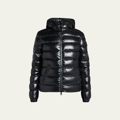 Moncler "Bady" jacket with detachable hood. Approx. length: 30" from shoulder to hem. Stand collar; two-way zipper. Long sleeves; left arm logo pocket. Angled zip pockets. Hip length hem. Fitted silhouette. 90/10 down/feather fill. Nylon shell. Nylon lining. Care instructions : Wash max. 30°C (mild process); Do not bleach; Do not tumble dry; Ironing maximum temperature 110°C (without steam); Dry cleaning in tetrachloroethene or with hydrocarbons (mild process); Professi... Classic Fitted Outerwear With Detachable Hood, Luxury Nylon Outerwear With Detachable Hood, Classic Fitted Hooded Outerwear, Fitted Hooded Outerwear With Zipper Closure, Winter Nylon Outerwear With Zip Cuffs, Luxury Black Puffer Jacket With Double-lined Hood, Black Luxury Puffer Jacket With Double-lined Hood, Hooded Outerwear With Padded Collar, Winter Outdoor Outerwear With Zip Cuffs