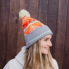 ALL SALES FINAL This Winter Sunset Pom Beanie is sure to warm your head and soul! Combining the cozy comfort of a beanie with a vivid, winter sunset design, it's the perfect way to brighten up the coldest of days. Embrace the cooler weather in style! A Montana Scene Original Design. All designs are property of The Montana Scene. All rights reserved.All of The Montana Scene apparel is designed and printed locally in Montana. Come visit our storefront locations! Bigfork * Whitefish * Missoula * Ka Cozy Multicolor Beanie For Outdoor, Blue Winter Beanie For Outdoor, Warm Playful Cap Beanie, Warm Multicolor Winter Beanie, Cozy Multicolor Outdoor Beanie, Sunset Design, Tea Towel Apron, Blue Q, Winter Sunset