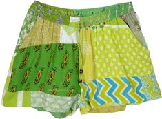 These sustainable, comfy, and unique shorts express your personality this season.  The shorts comprise multiple pieces of recycled or leftover fabric sewn together. #tlb #JuniorPetite #beachwrap #Indian #Handmade #HippieShorts #BeachShorts #PatchworkShorts Green Patchwork Bottoms For Summer, Summer Green Patchwork Bottoms, Summer Green Shorts With Patchwork, Cotton Hippie Shorts, Hippie Green Festival Shorts, Green Hippie Festival Shorts, Green Bohemian Shorts For Summer, Green Cotton Pajama Shorts, Bohemian Patchwork Shorts