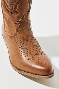 Coconuts by Matisse Footwear Gaucho cowboy boots in premium faux leather finished with western stitching. Features Coconuts by Matisse Footwear Gaucho cowboy boots Faux leather cowboy boots Western boot stitching Pull tabs Content + Care Synthetic Wipe clean Imported Size + Fit Heel: 1.5" | Coconuts By Matisse Footwear Gaucho Cowboy Boot in Tan, Women's at Urban Outfitters Casual Brown Moto Boots For Rodeo, Fall Rodeo Brown Mid-calf Boots, Western Style Brown Mid-calf Boots For Spring, Western Style Faux Leather Mid-calf Boots For Spring, Western Moto Boots For Ranch In Fall, Western Style Moto Boots For Ranch In Fall, Western Style Moto Boots For Fall Ranch, Western Style Moto Boots For Fall Ranch Occasions, Brown Moto Boots For Rodeo In Fall