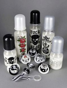 an assortment of various bottles and scissors on a gray background with the words rock printed on them