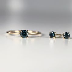 "14k yellow gold and blue diamond stud earrings. They will make a great companion to your beautiful wedding. They are very elegant for daily use or for official gatherings. SOLD AS PAIR. Material; 14k solid gold studs Round blue diamonds are 3mm Prong settings. 14k gold backings included. On the pictures you see 14k solid gold hammered bar studs are available from this link; https://www.etsy.com/listing/953435550/14k-gold-hammered-bar-stud-earrings-tiny? Matching ring is available here https://w Wedding Rings In Yellow Gold With Matching Earrings, Yellow Gold Wedding Rings With Matching Earrings, 14k Yellow Gold Solitaire Earrings, Blue 14k Gold Earrings For Wedding, Blue Diamond Earrings, Stud Earrings Diamond, Blue Diamonds, Bar Stud Earrings, Matching Ring