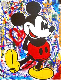 a mickey mouse painting on a wall with lots of paint splattered all over it