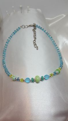 "Blue Beaded Necklace *FREE SHIPPING*/Silver Jewelry Unique Silver, Blue, Sea foam Green, Choker with Czech Glass Beads. This beach inspired Choker are sure to be a hit this summer with you or as a great thoughtful gift! The choker will fit necks from 13\" inches up to 16\" inches. Length of the choker 13\" to 15\" inches, allowing chain dangle on end, depending on where you hook the clasp on the extension chain. Hypoallergenic to eliminate irritation/ Excellent customer reviews/Handmade in the Blue Beaded Necklaces For Jewelry Making In Summer, Summer Blue Necklaces With Spacer Beads, Blue Beaded Bracelets With Silver Beads For Beach, Colorful Beaded Blue Jewelry For Summer, Handmade Silver Beaded Necklaces For Summer, Blue Jewelry With Colorful Beads For Summer, Handmade Silver Beaded Necklace For Summer, Blue Jewelry With Silver Beads For The Beach, Blue Jewelry With Silver Beads For Summer