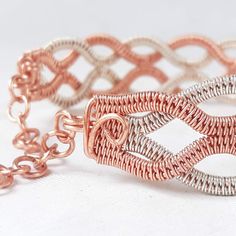 German silver and copper bracelet with interlocking pattern. This beautiful bracelet has been meticulously crafted. It is inspired by art deco and has an original and unique style that makes it shine by itself. It is a bracelet that can be adjusted by a chain and fits perfectly to any size. Attractive and succulent, ideal for a formal event, a cocktail party or a night out. It is the best complement to your everyday look. This bracelet has been designed and handmade by me with German silver wire Interlocking Pattern, Hair Ornaments Wedding, Bracelet Valentines, Scrapbook Box, Celtic Bracelet, Bracelet Art, Art Deco Bracelet, Copper Style, Valentines Gifts For Her