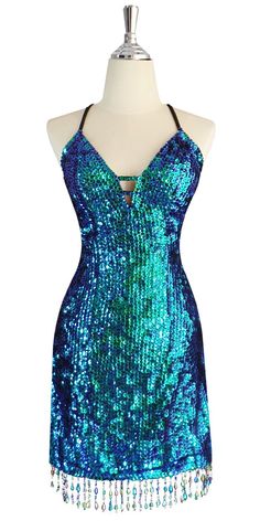 Glamorous Green Embellished Mermaid Dress, Embellished Fitted Green Mermaid Dress, Glamorous Blue Sequin Mermaid Dress, Iridescent Sequin Dress For Night Out, Green Shimmer Party Dress, Glamorous Green Shimmer Dresses, Green Fitted Mermaid Dress, Blue Sequined Mermaid Dress, Green Sequined Mermaid Dress For Evening