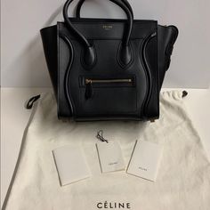 100% Authentic Celine Micro Luggage Handbag In Smooth Calfskin In Black. Only Used It Couple Of Times. Will Comes With A Dust Bag. Will Record Shipment Process For Both Of Our Protection. **Product Details**11 X 11 X 6 In (27 X 27 X 15 Cm)Calfskinlambskin Lininggold Metal Hardwarehand Carryzipped Closure Inner Zipped Pocket And Double Flat Pocket Outer Zipped Pocket On Fronthandles With 5 In (12 Cm) Dropprotective Studs On Base **Come From A Smoke Free/Pet Free Home*** Celine Micro Luggage, Celine Micro, It Couple, Black Only, Celine Luggage Bag, Celine Bags, Celine Bag, Womens Tote Bags, Calf Skin