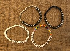 "This listing is for one elastic bracelet that reads \"andra tutto bene\" -- it's an Italian phrase that translate to \"everything will be fine.\" You choose the colors -- black and white for the letters beads, and black, white, silver or rainbow for the rest of the bracelet! (Please see pics.) All bracelets are made with a strong elastic band. One size fits all on these -- 7 inches, which works well on most wrists. Not sure about size or have a question? Email me! I happily work on custom order Casual Stretch Bracelet With Letter Print, Casual Flexible Beaded Bracelets With Letter Beads, Inspirational Beaded Bracelets With Letter Print As Gift, Casual Flexible Jewelry As Gift, Casual Name Bracelet With Letter Beads For Gift, Casual Personalized Beaded Bracelets For Everyday, Casual Letter Beads Name Bracelet Gift, Casual Stackable Stretch Bracelet As Gift, Casual Stackable Stretch Bracelet Gift