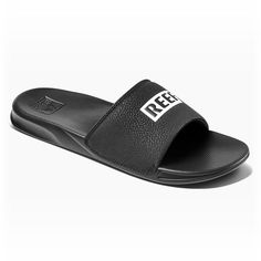 A casual lifestyle is calling your name, and these men's Reef One slide sandals are a quick and simple way to aid your oceanic adventure.Click this FOOTWEAR GUIDE to find the perfect fit and more! A casual lifestyle is calling your name, and these men's Reef One slide sandals are a quick and simple way to aid your oceanic adventure.Click this FOOTWEAR GUIDE to find the perfect fit and more! SANDAL FEATURES Water friendly synthetic straps Super soft padded jersey lining Non-marking outsoleSANDAL Comfortable Slip-on Sandals For Water Sports, Open Toe Sport Sandals For Water Sports In Summer, Casual Slide Flip Flops For Outdoor Activities, Casual Slide Sandals For Water Sports, Sporty Open Toe Slides For Water Sports, Comfortable Slides With Cushioned Footbed For Water Sports, Casual Slip-on Sport Sandals For Water Sports, Casual Open Toe Flip Flops For Water Sports, Casual Non-slip Slides For Water Sports