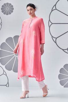 Gelato chanderi silk tunic with scattered contrast floral embroidery and felt accents. Comes along with an inner and pant. - Aza Fashions Silk Resham Embroidery Tunic Kurta, Silk Resham Embroidery Kurta Tunic, Silk Tunic Kurta With Resham Embroidery, Silk Kurta With Resham Embroidery Tunic, Festive Silk Tunic With Floral Embroidery, Spring Silk Kurta With Zari Work, Silk Kurta With Zari Work For Spring, Silk Straight Kurta Tunic For Eid, Spring Designer Silk Kurta